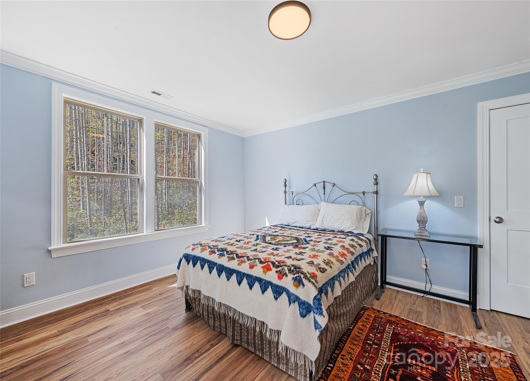 85 Garnet Spg Lane Waynesville, NC 28785 - Photo 25 of 36 a bedroom with a bed and a window