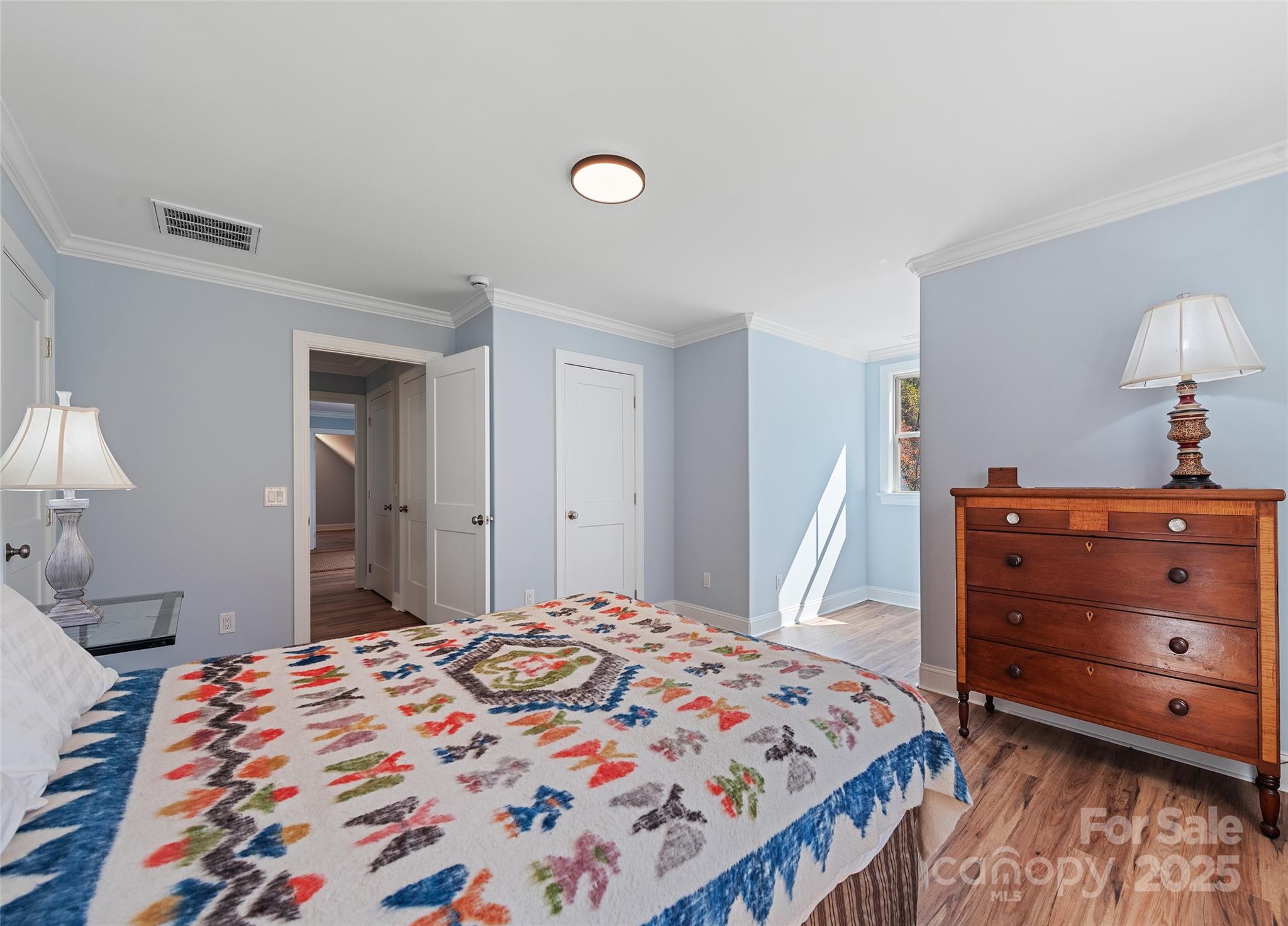 85 Garnet Spg Lane Waynesville, NC 28785 - Photo 26 of 36 a bedroom with a bed and a dresser in it