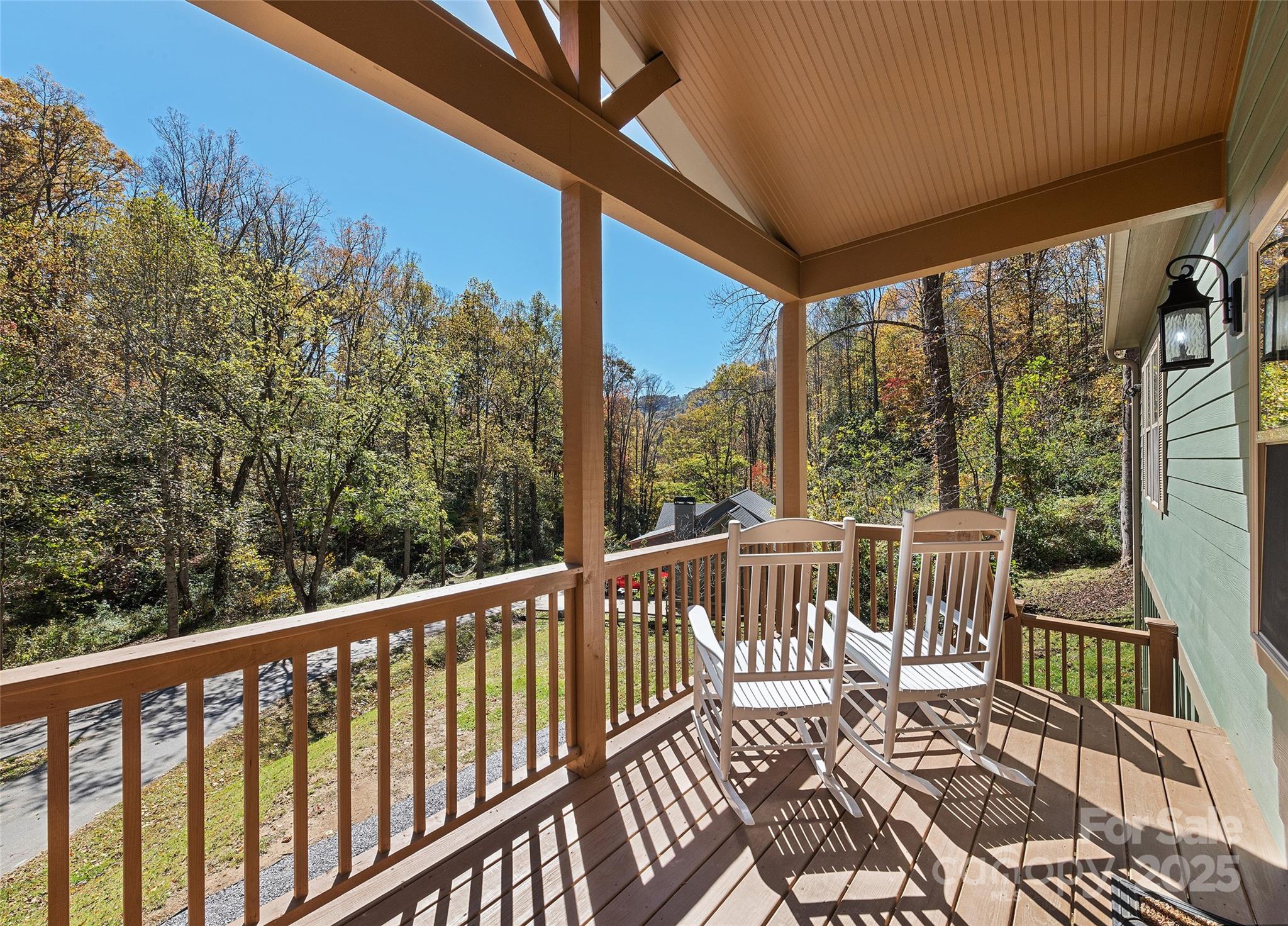 85 Garnet Spg Lane Waynesville, NC 28785 - Photo 3 of 36 a view of a two chairs in the balcony