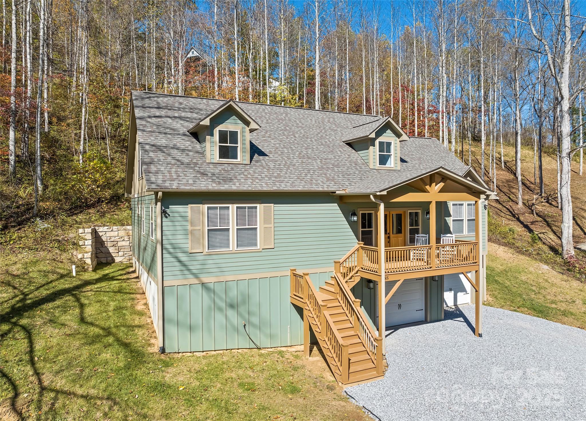 85 Garnet Spg Lane Waynesville, NC 28785 - Photo 34 of 36 a front view of a house with a yard