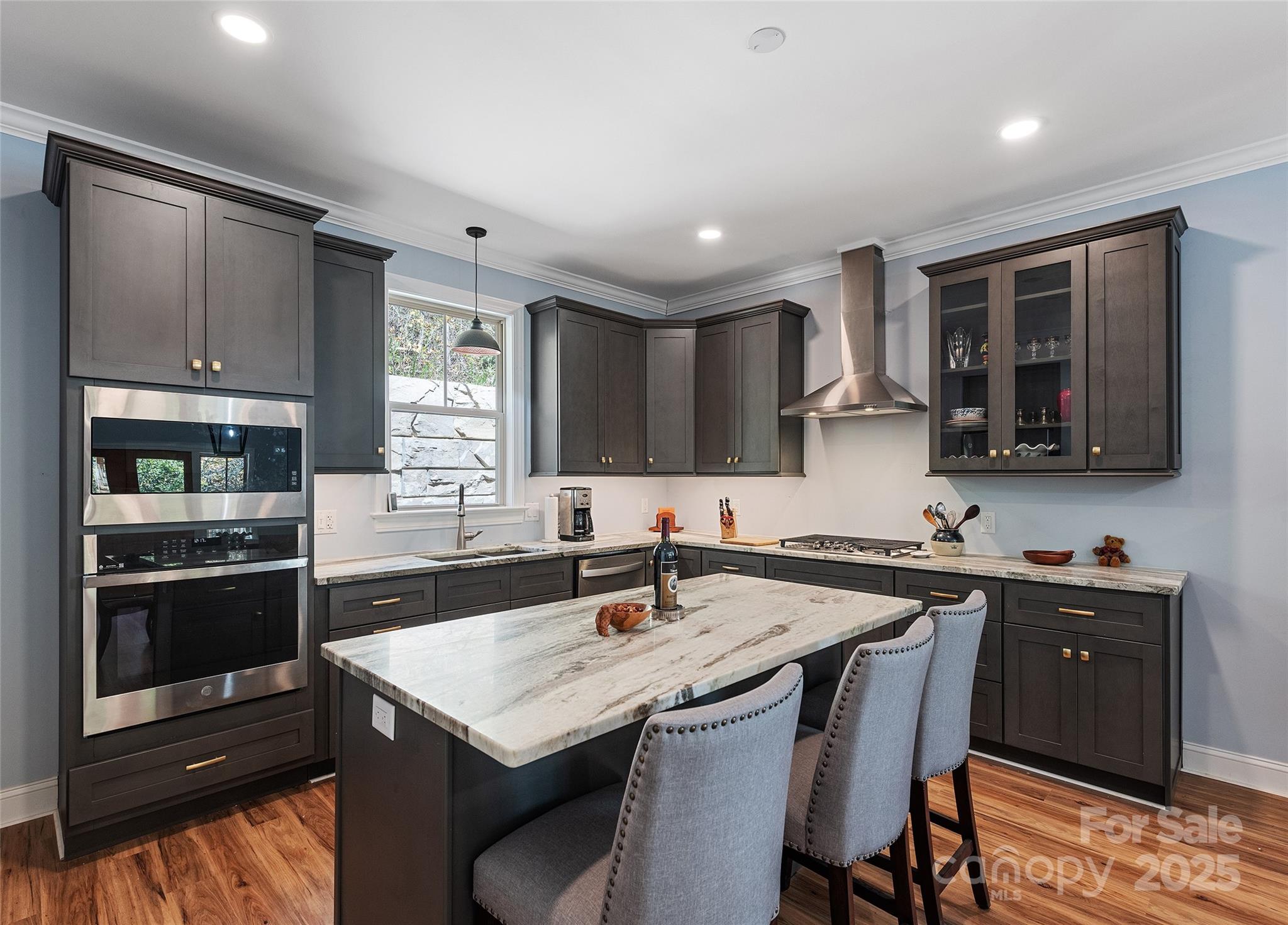 85 Garnet Spg Lane Waynesville, NC 28785 - Photo 9 of 36 a kitchen with a stove a sink and a refrigerator