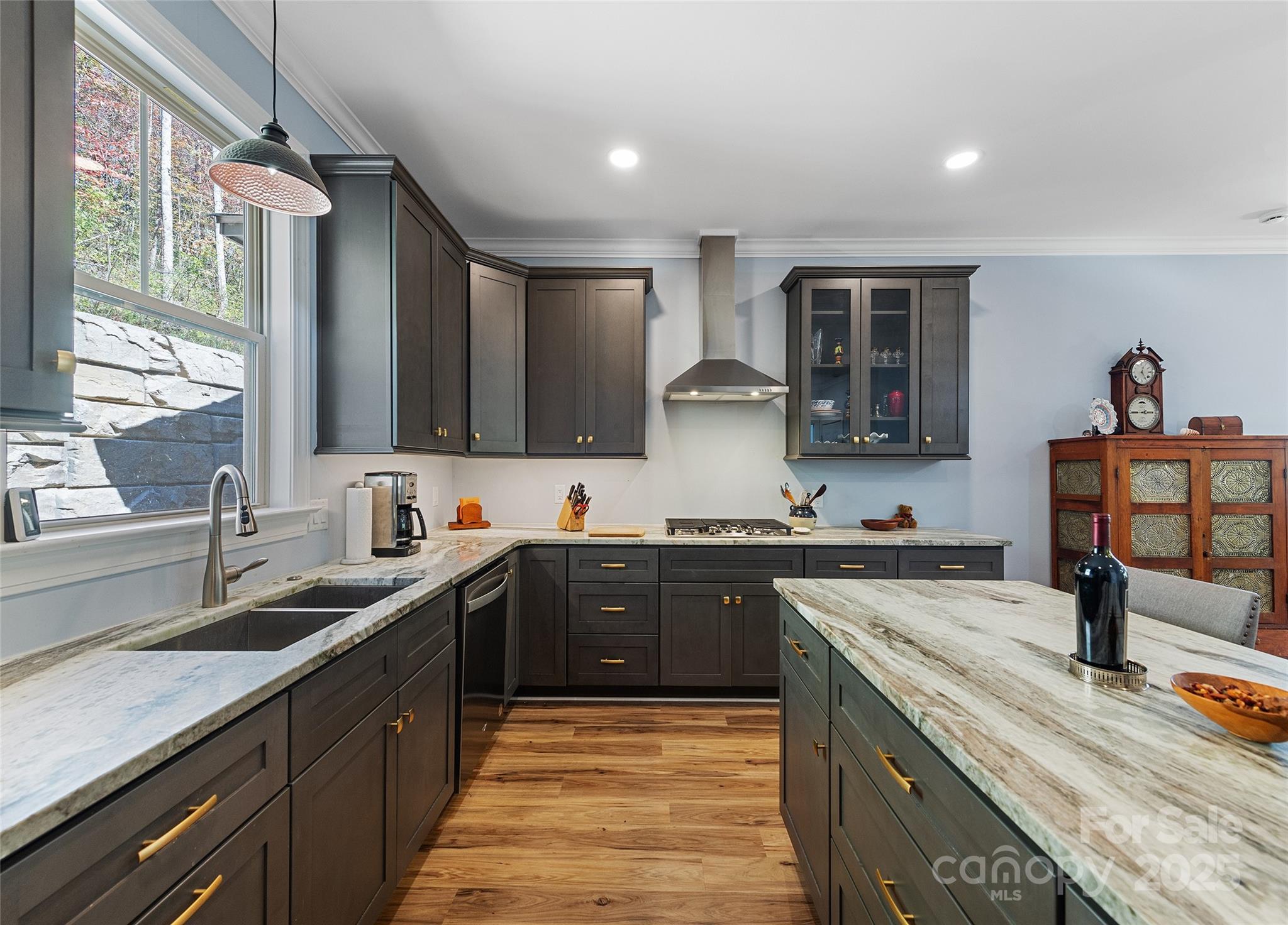 85 Garnet Spg Lane Waynesville, NC 28785 - Photo 10 of 36 a kitchen with a sink stove and cabinets