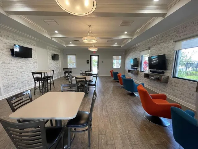 a view of a dining room with furniture