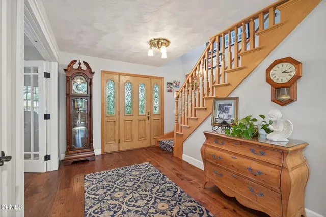a bath tub sitting in a bathroom next to a window