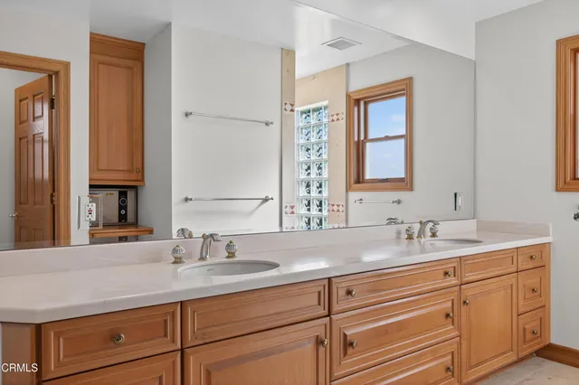 a kitchen with lots of counter top space and dining table