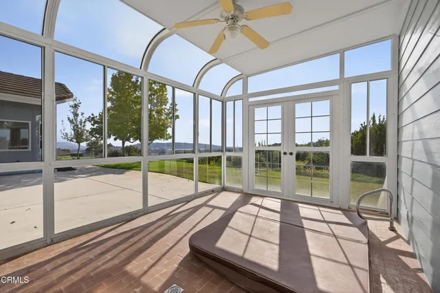 a kitchen with granite countertop a stove and a sink
