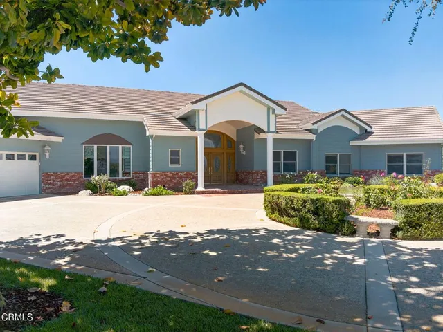 a view of a lake with a building in the background