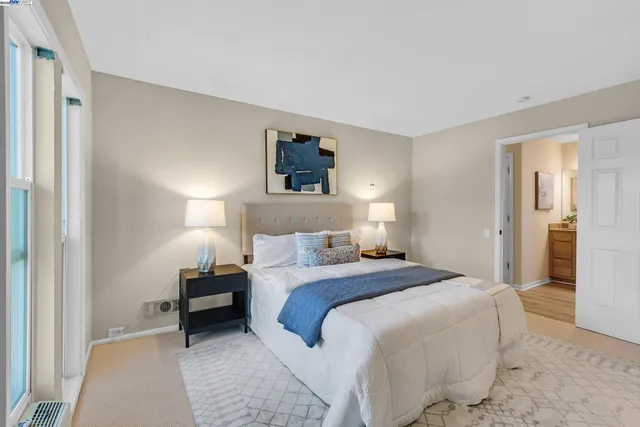 a bathroom that has a glass shower door