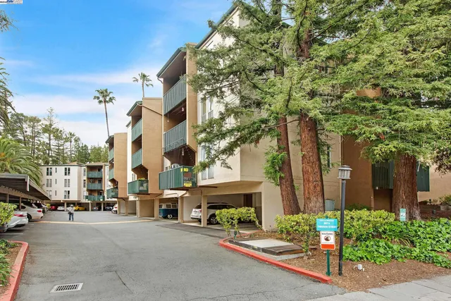 a view of an empty room with stairs