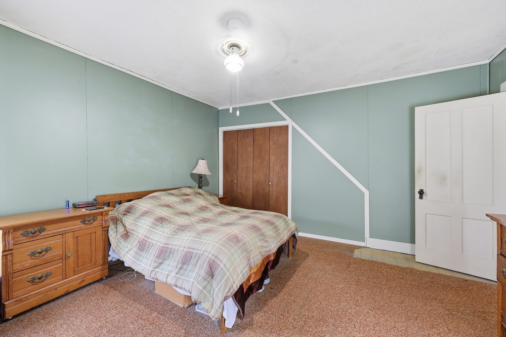 84 Middlefield Road Chester, MA 01011 - Photo 24 of 36 a bedroom with a bed and closet