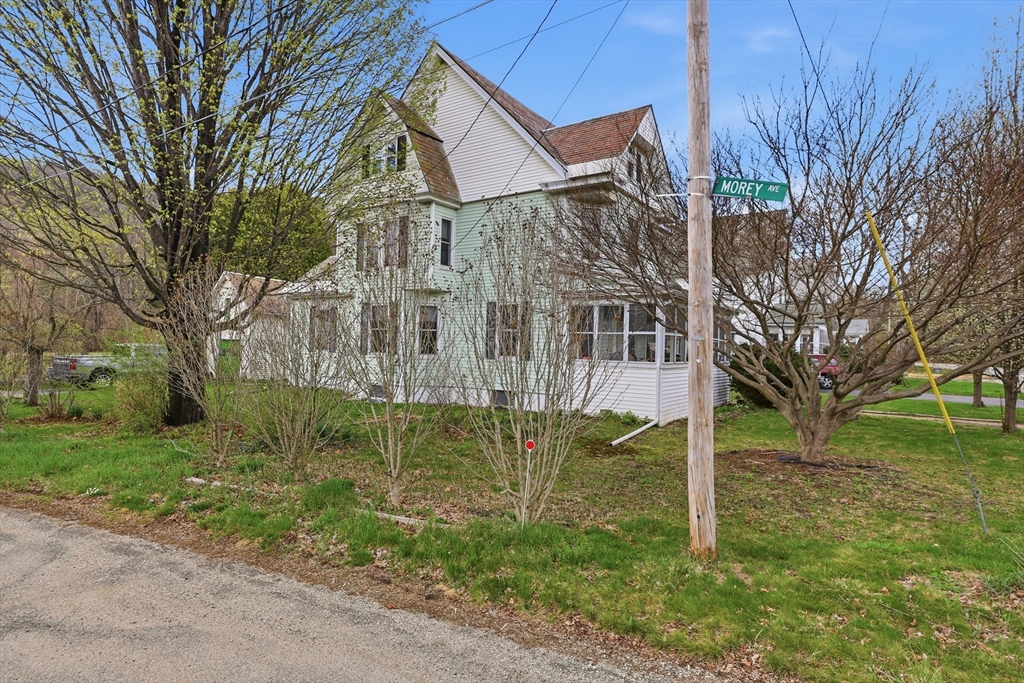 84 Middlefield Road Chester, MA 01011 - Photo 29 of 36 a view of a house with a yard