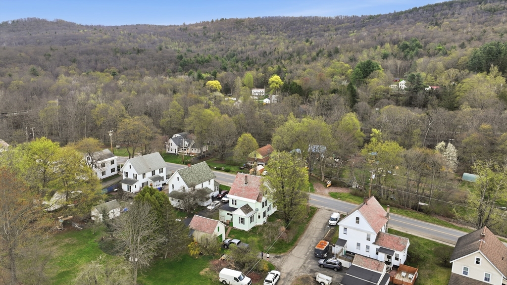 84 Middlefield Road Chester, MA 01011 - Photo 30 of 36 an aerial view of a town with couple of houses