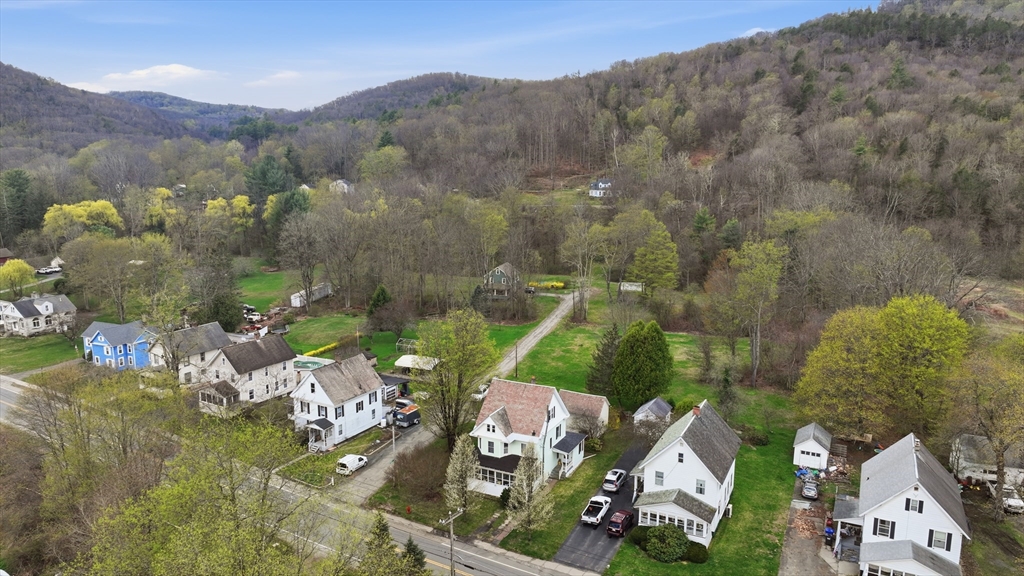 84 Middlefield Road Chester, MA 01011 - Photo 34 of 36 an aerial view of a house with garden