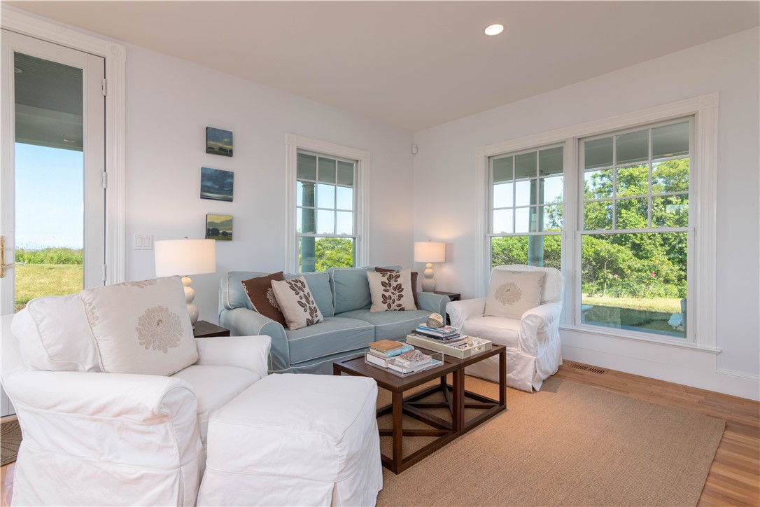 1307 Peckham Farm Road Block Island, RI 02807 - Photo 9 of 32 Living room with access to porch