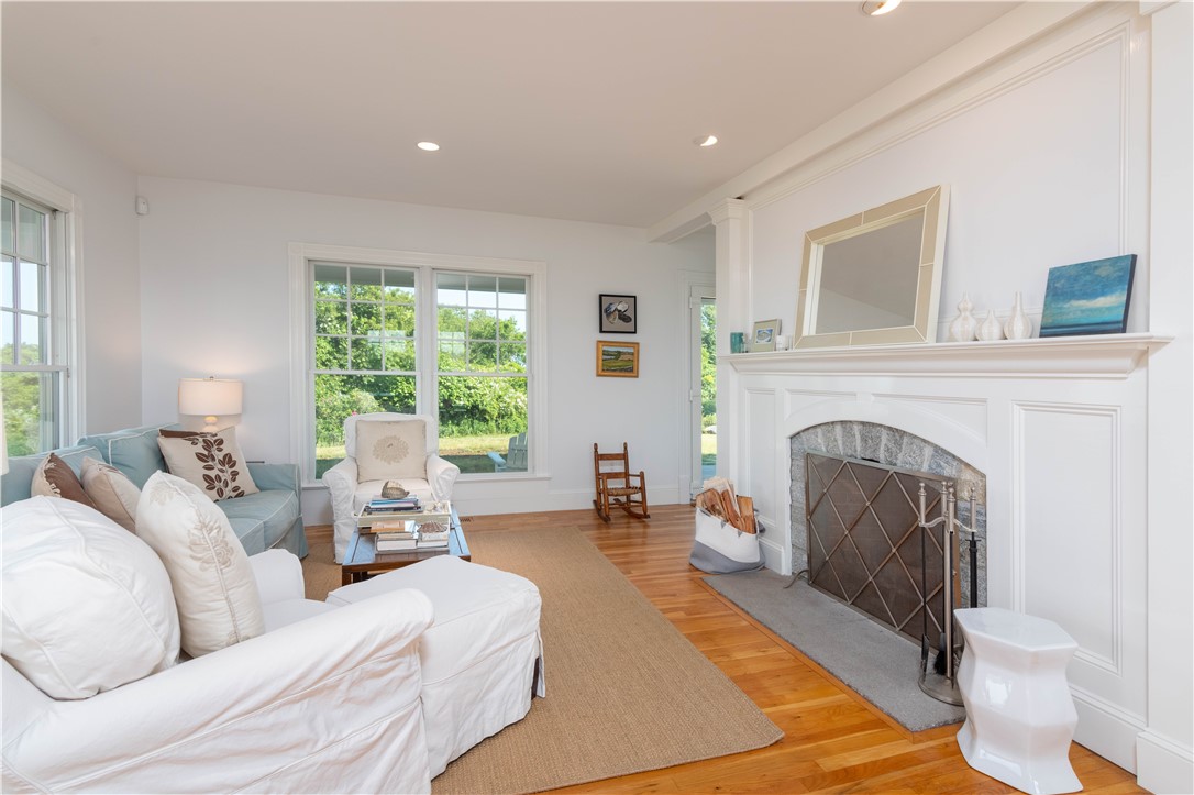 1307 Peckham Farm Road Block Island, RI 02807 - Photo 10 of 32 Conversation area around fireplace