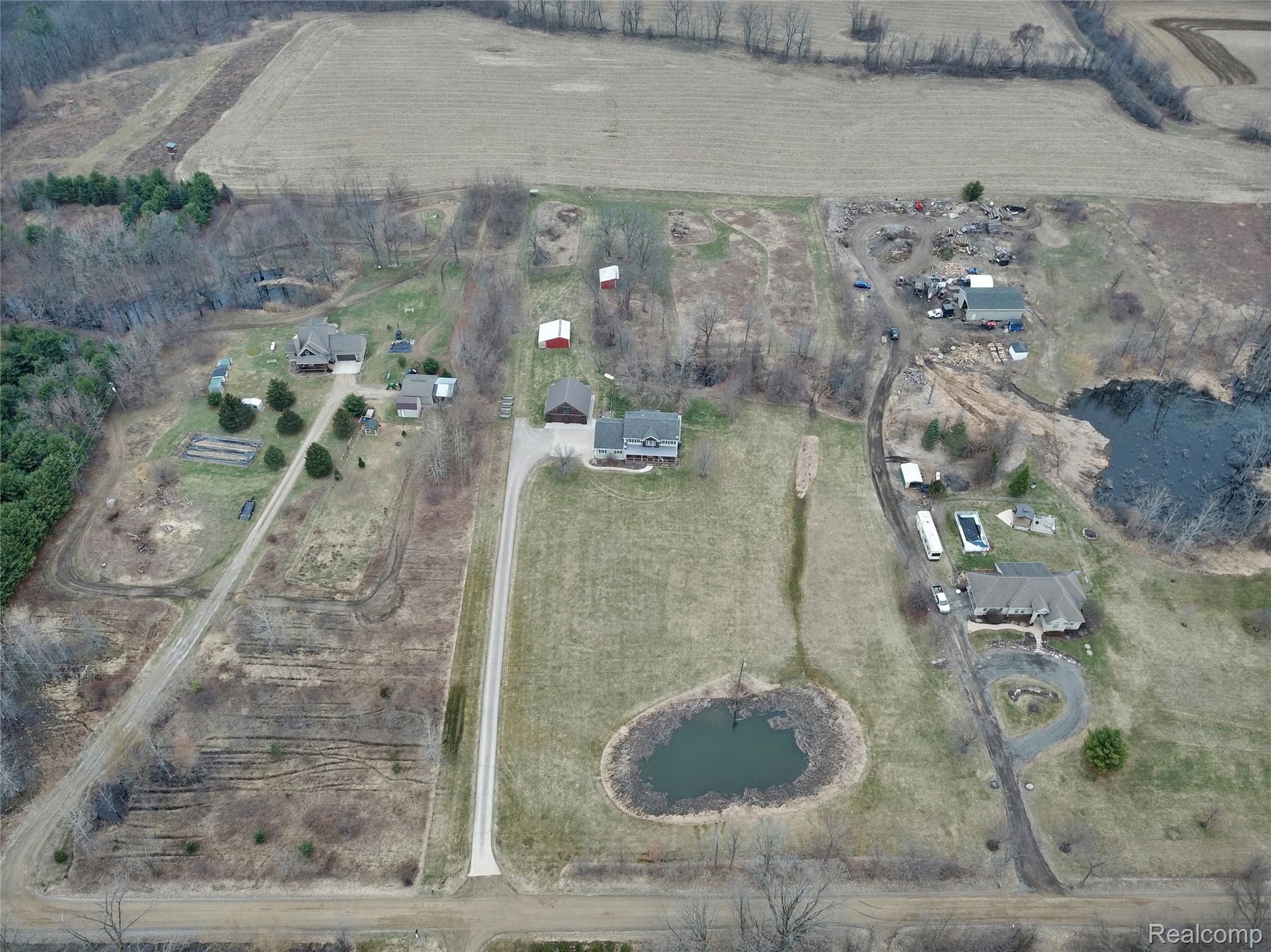 3690 Brauer Road Oxford, MI 48371 - Photo 54 of 63 Aerial view of property and surrounding area featuring rural landscape and farmland