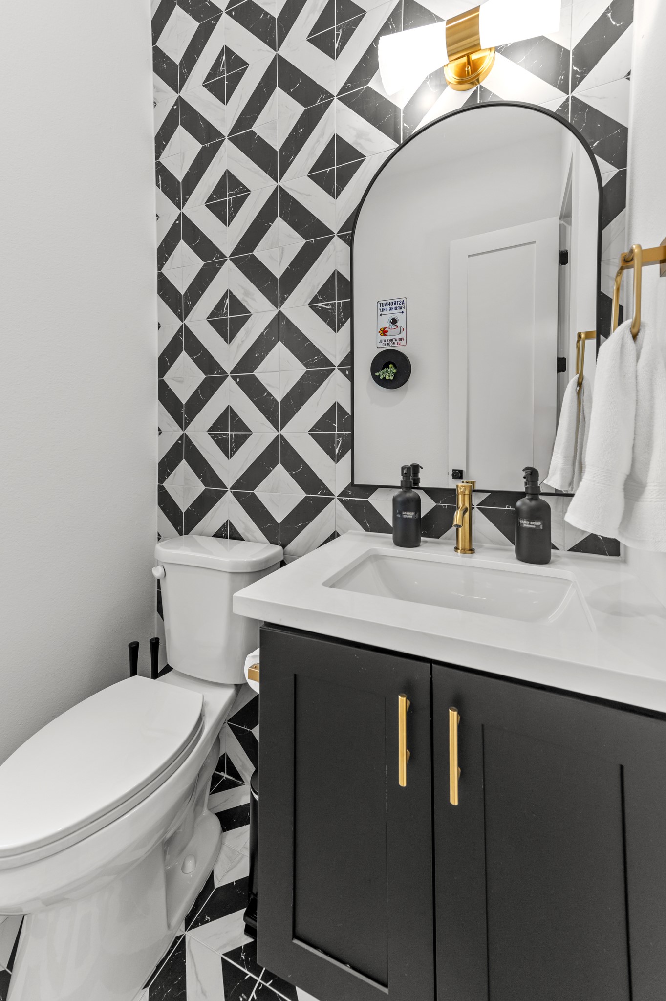 3313 Hadley Street, Unit B Houston, TX 77004 - Photo 19 of 26 a bathroom with a sink a toilet and mirror
