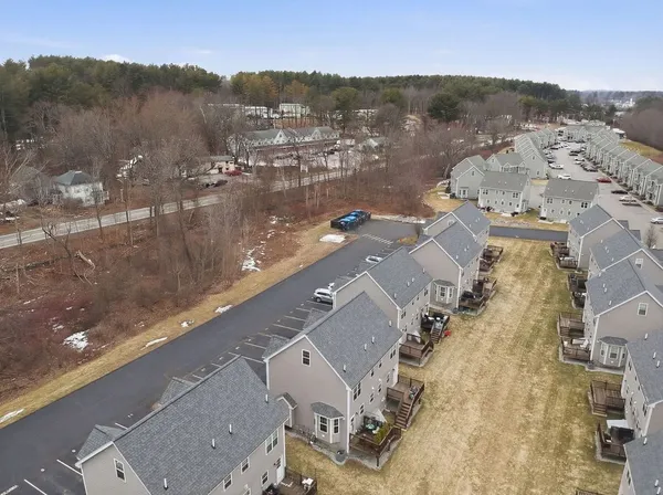 an aerial view of residential building with outdoor space