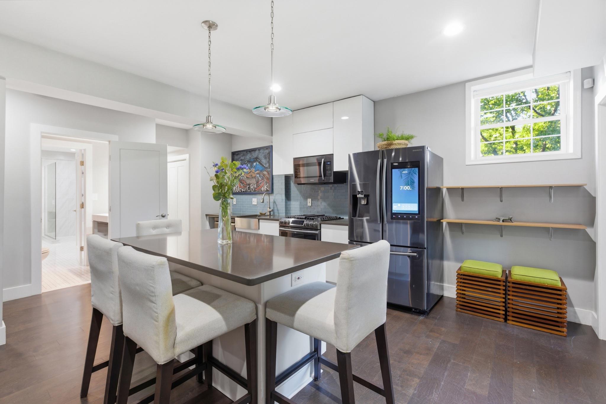 1219 Meadow View Road Pasadena, MD 21122 - Photo 48 of 70 Lower level modern kitchen with sleek design.