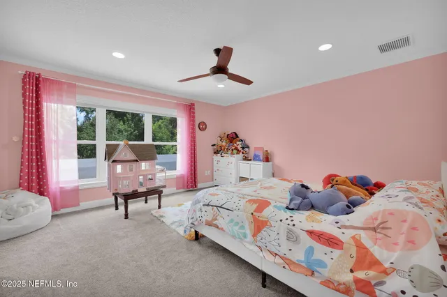 an aerial view of a house with a garden