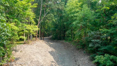 a view of a backyard of the house