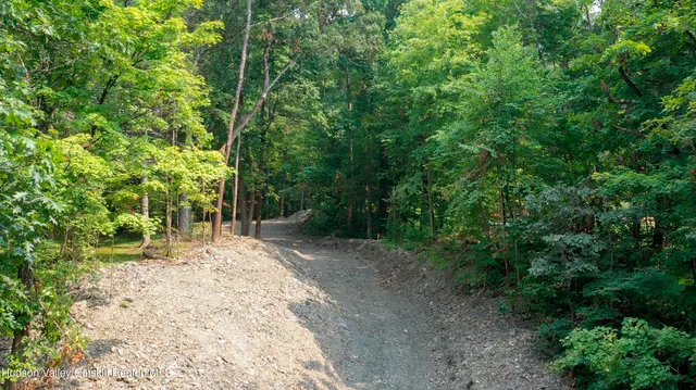 a view of a backyard of the house