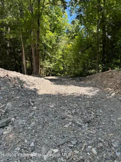 a view of a backyard of the house