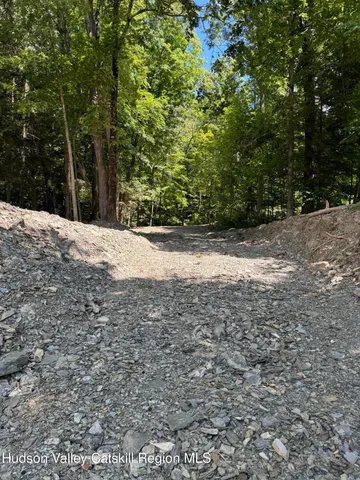 a view of a backyard of the house