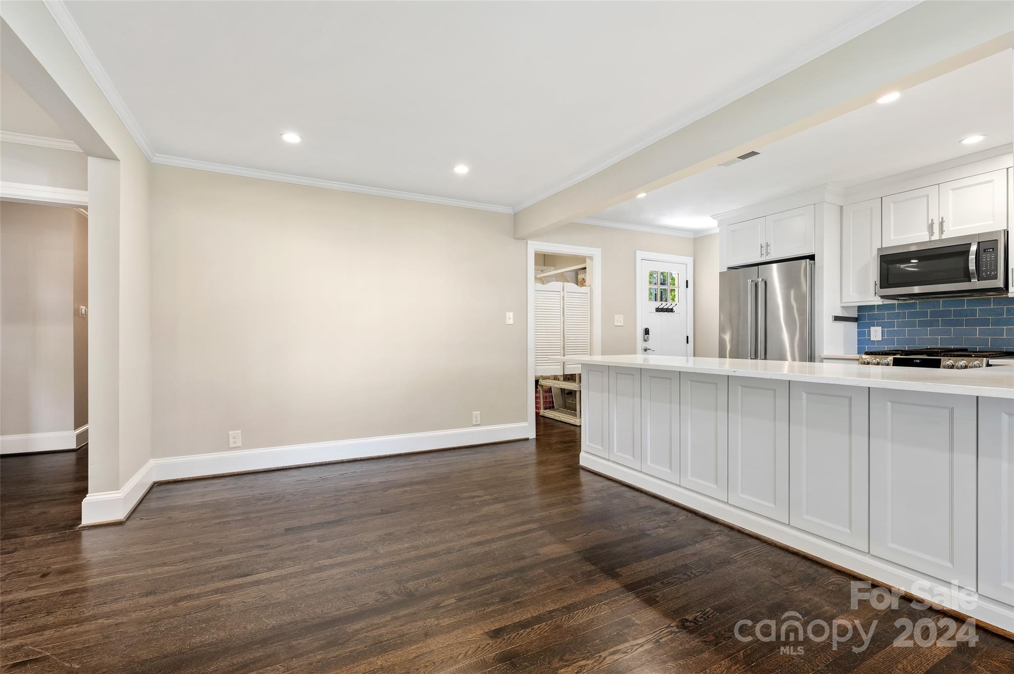 3233 Pinehurst Place Charlotte, NC 28209 - Photo 11 of 39 a view of a kitchen with electric equipment