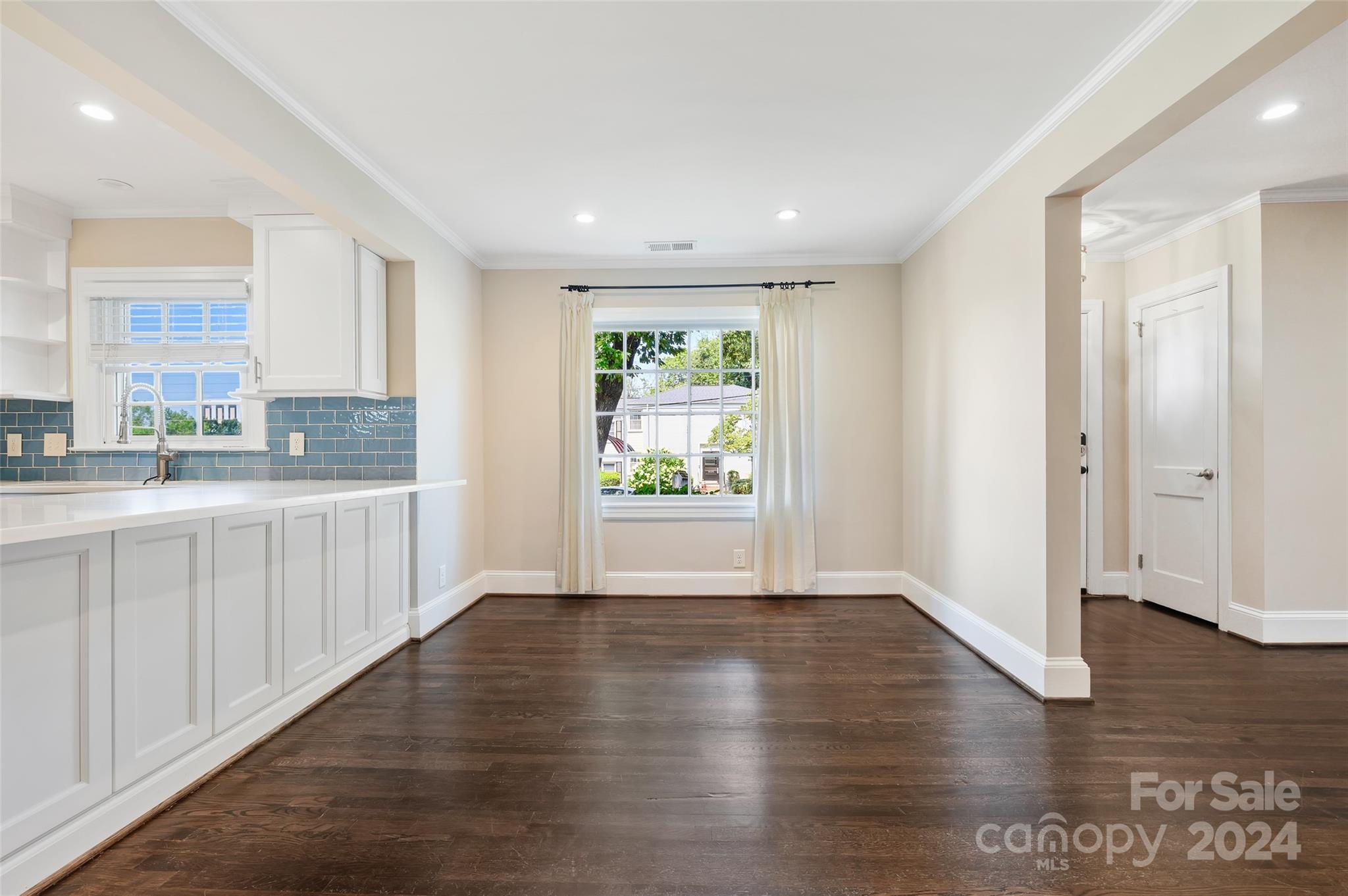 3233 Pinehurst Place Charlotte, NC 28209 - Photo 10 of 39 a view of kitchen with wooden floor electronic appliances and window