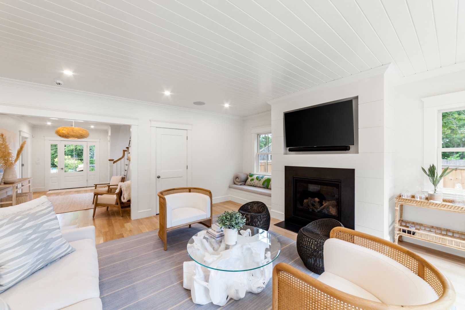 38 Pinehurst Road Edgartown, MA 02539 - Photo 11 of 38 a living room with furniture a fireplace and a flat screen tv