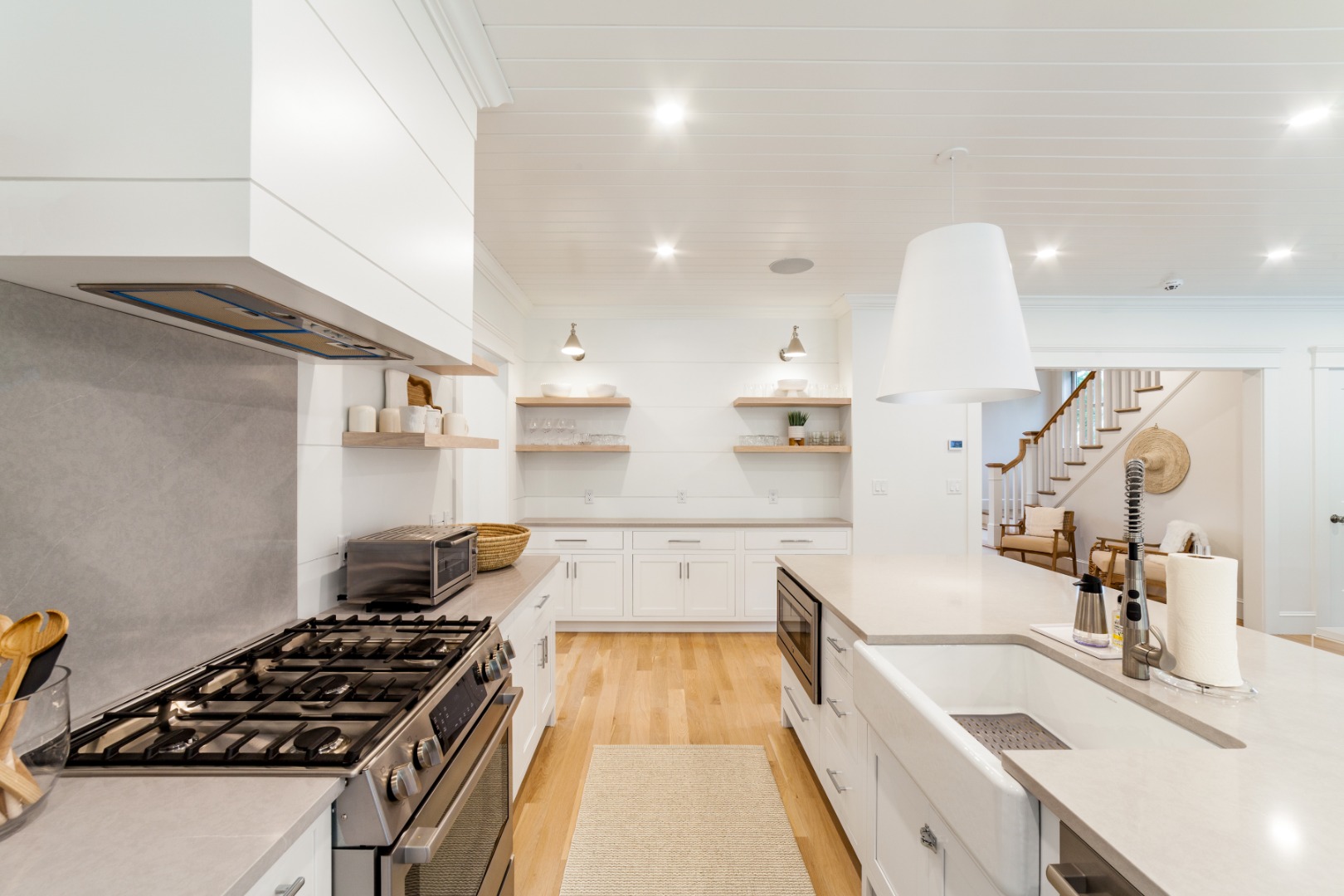 38 Pinehurst Road Edgartown, MA 02539 - Photo 12 of 38 a kitchen with sink stove and cabinets