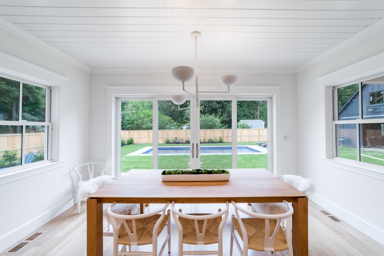 38 Pinehurst Road Edgartown, MA 02539 - Photo 13 of 38 a dining room with a table and chairs