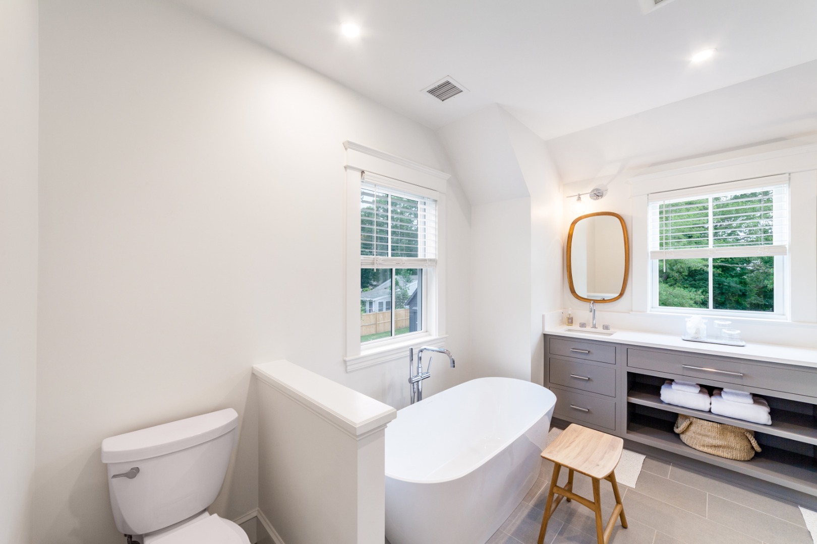 38 Pinehurst Road Edgartown, MA 02539 - Photo 26 of 38 a bathroom with a toilet a sink and a mirror