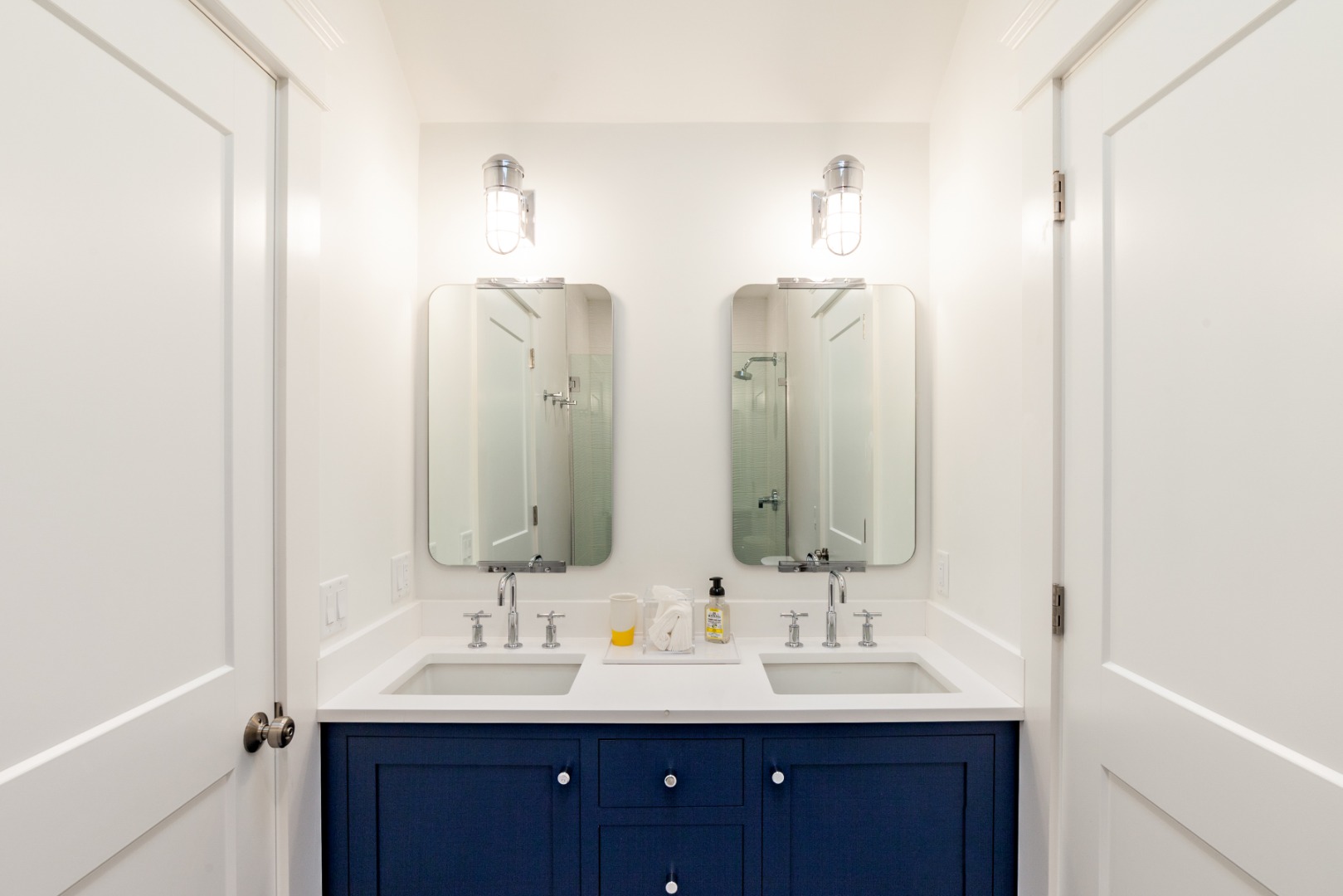 38 Pinehurst Road Edgartown, MA 02539 - Photo 30 of 38 a bathroom with double vanity sinks and a mirror