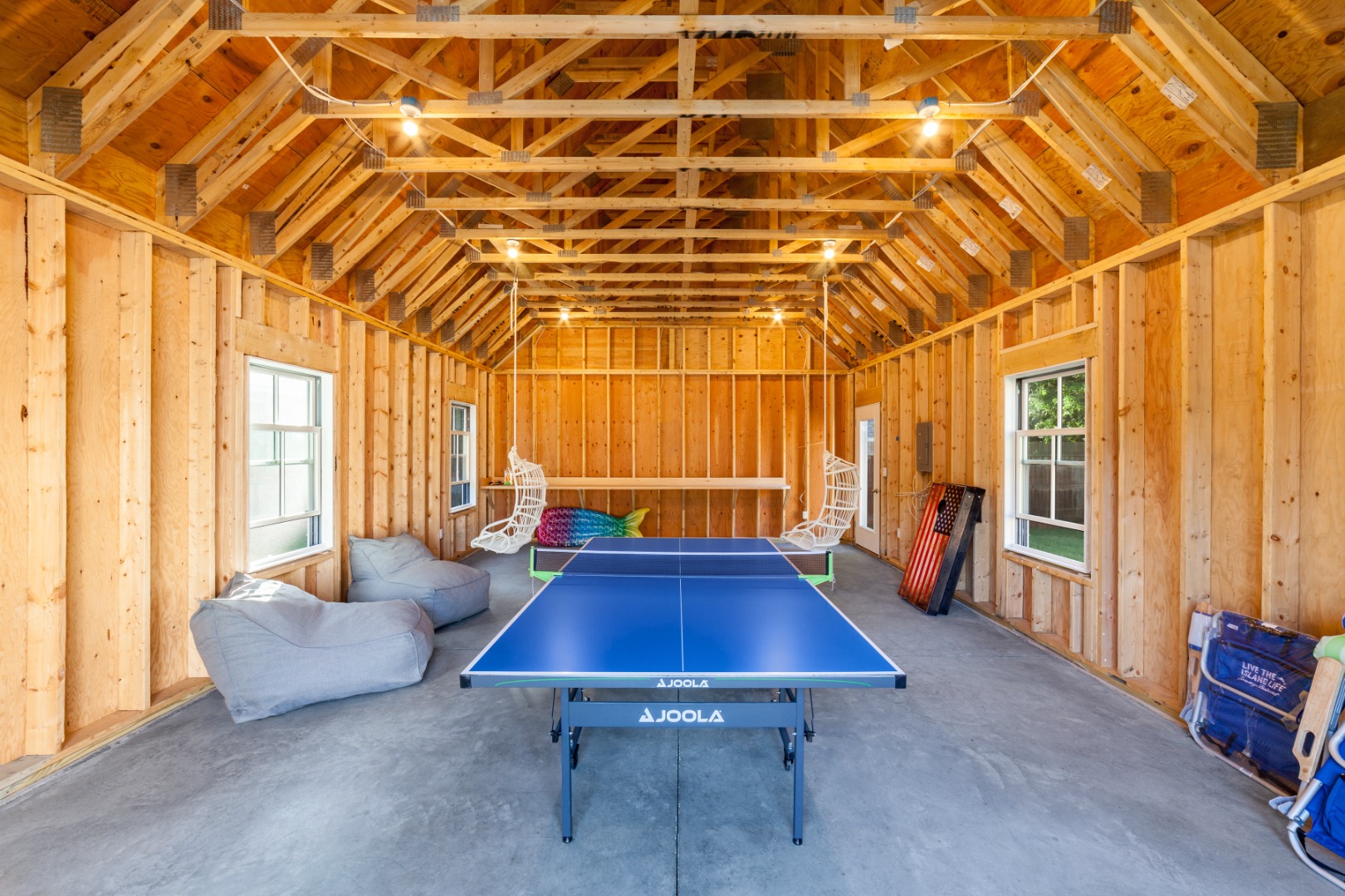 38 Pinehurst Road Edgartown, MA 02539 - Photo 37 of 38 a living room with patio furniture and a window