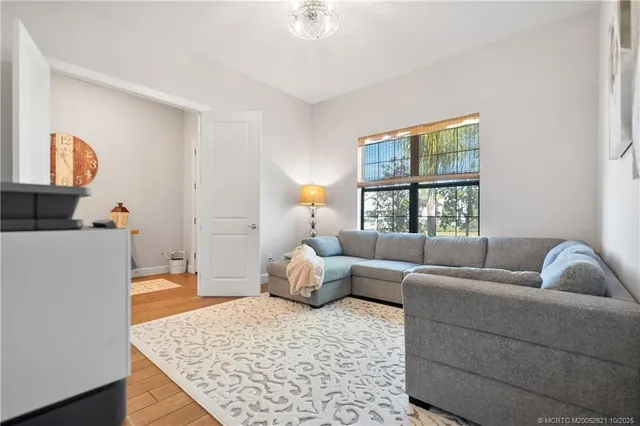 a bathroom with a sink mirror and toilet