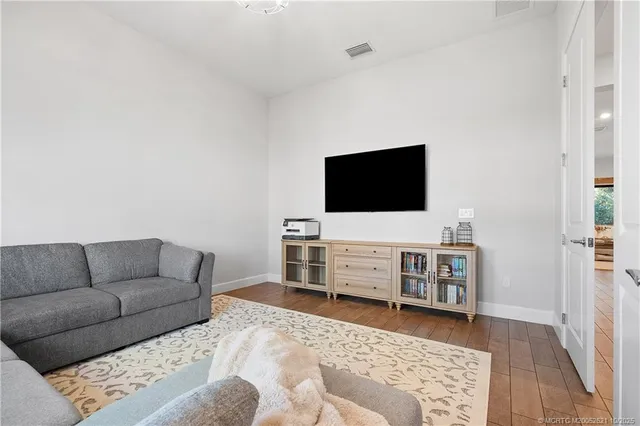 a view of a living room with a flat screen tv