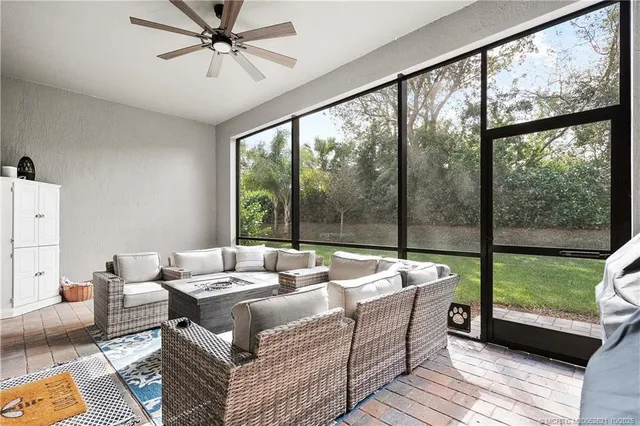 a living room with couch and a window