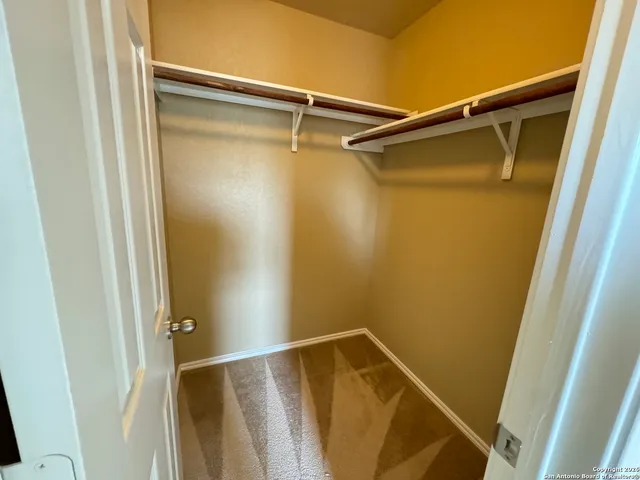 an empty room with a natural light