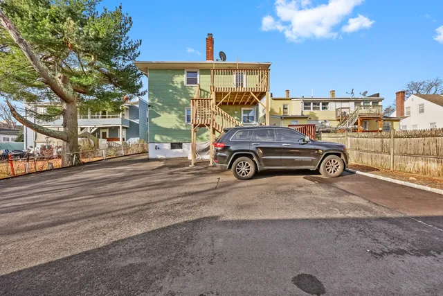 a car parked on the side of a street
