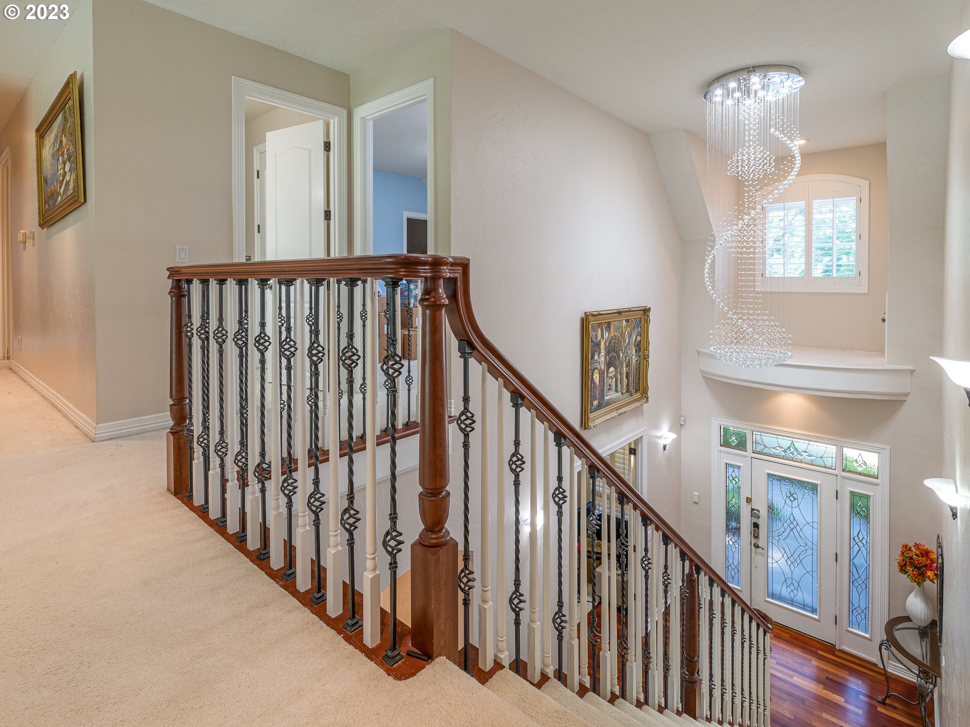 565 Southeast 46th Drive Gresham, OR 97080 - Photo 34 of 48 a view of a hallway with wooden floor and staircase