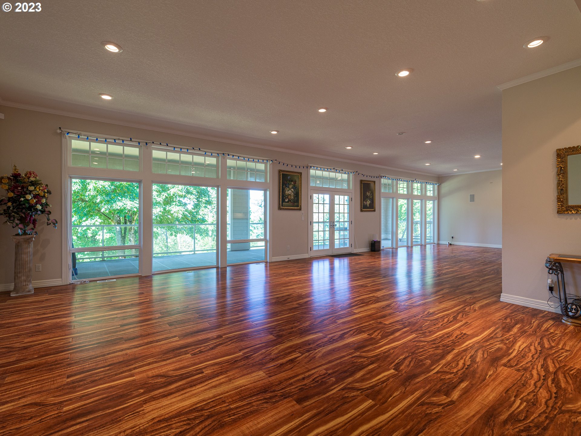 565 Southeast 46th Drive Gresham, OR 97080 - Photo 43 of 48 a view of empty room with wooden floor and fan