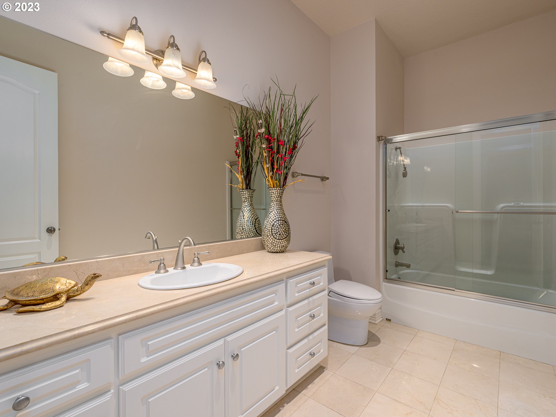 565 Southeast 46th Drive Gresham, OR 97080 - Photo 45 of 48 a bathroom with a double vanity sink mirror and shower