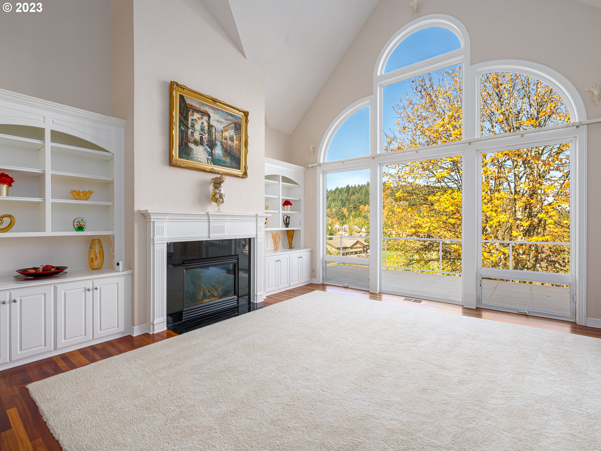 565 Southeast 46th Drive Gresham, OR 97080 - Photo 8 of 48 a view of an empty room with a window and fireplace