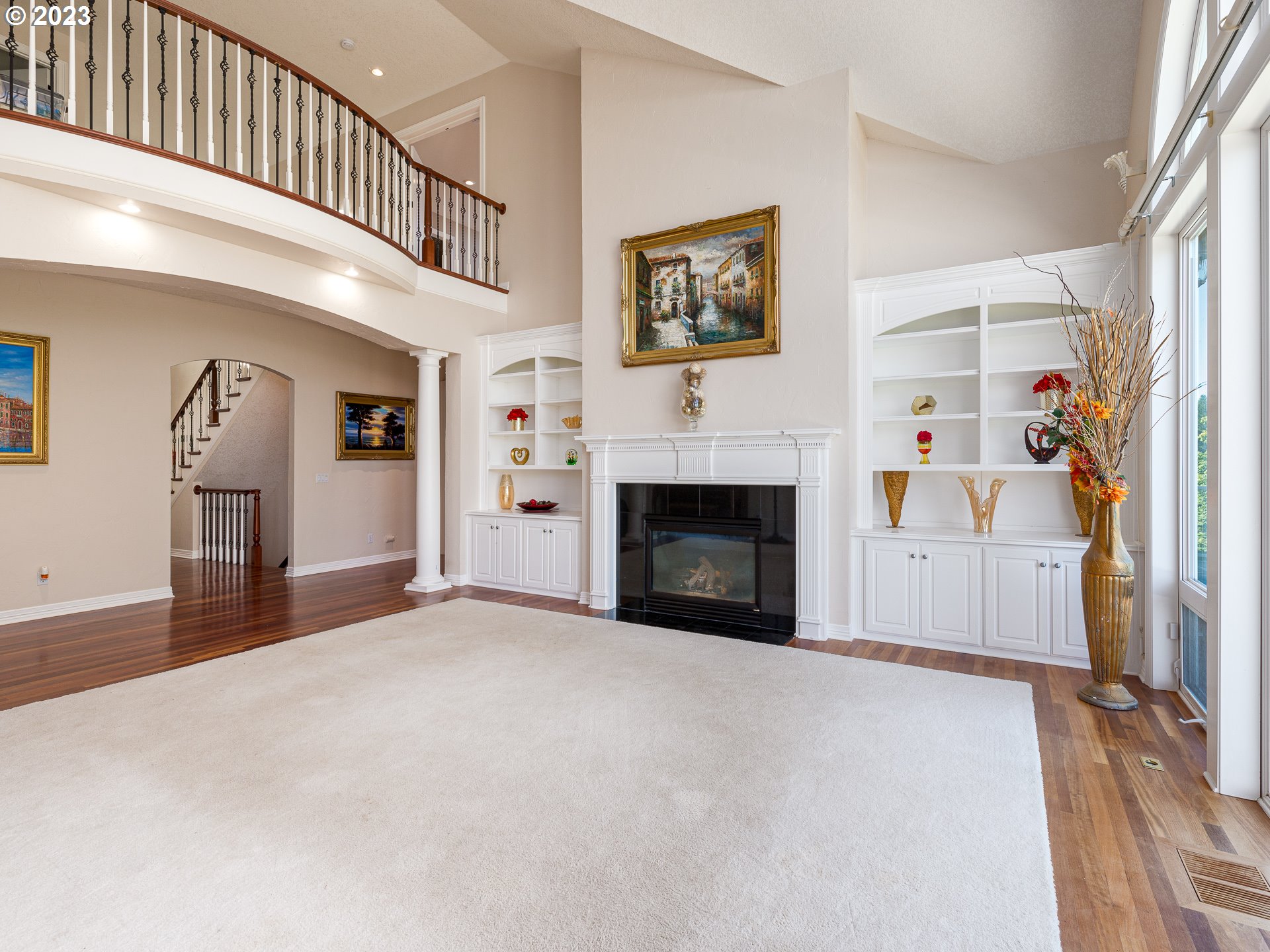 565 Southeast 46th Drive Gresham, OR 97080 - Photo 10 of 48 a view of a livingroom with an empty space and a fireplace