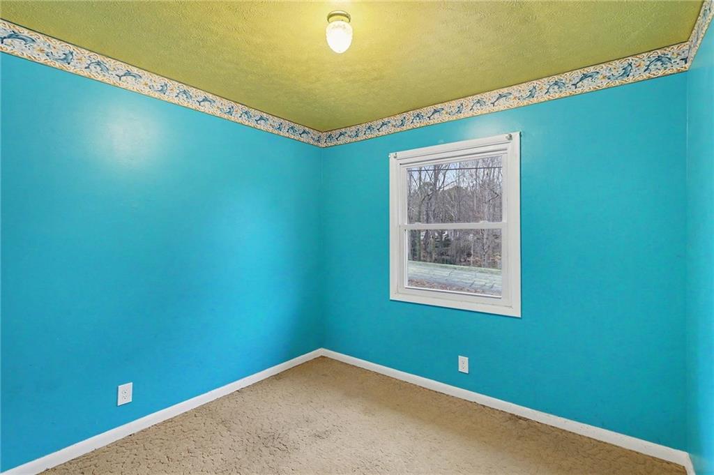 91 Berlin Street Tallapoosa, GA 30176 - Photo 17 of 25 a view of a small space with a window