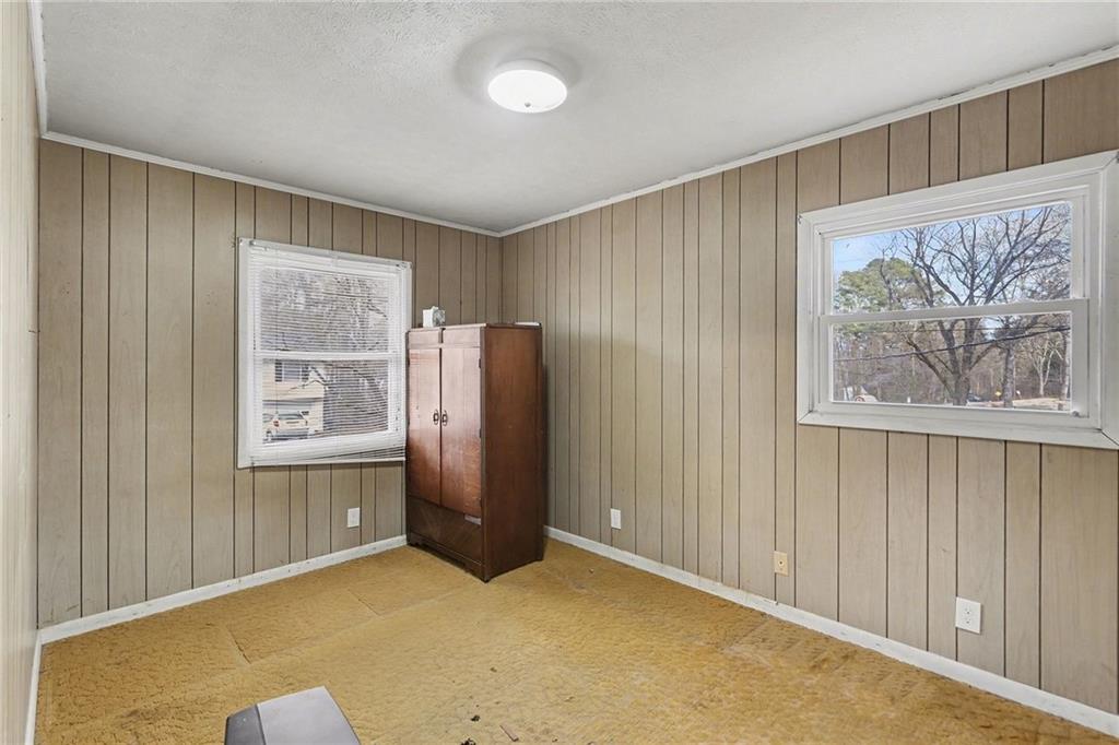 91 Berlin Street Tallapoosa, GA 30176 - Photo 9 of 25 a view of an empty room and window