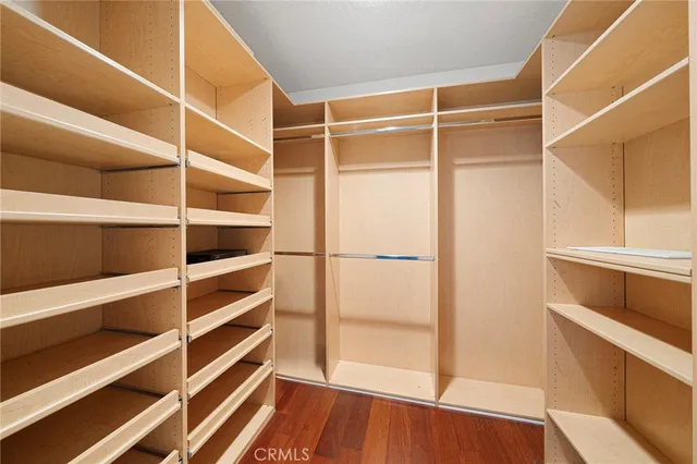 a bathroom with a granite countertop sink mirror and double