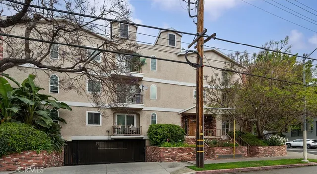 a view of a house with a street